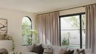 A room fitted with TWOPAGES curtains