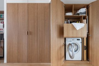 utility room shelving with oak cabinets