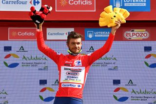 VALDEPEAS DE JAN SPAIN AUGUST 25 Odd Christian Eiking of Norway and Team Intermarch Wanty Gobert Matriaux celebrates winning the Red Leader Jersey on the podium ceremony after the 76th Tour of Spain 2021 Stage 11 a 1336km stage from Antequera to Valdepeas de Jan 1009m lavuelta LaVuelta21 on August 25 2021 in Valdepeas de Jan Spain Photo by Stuart FranklinGetty Images