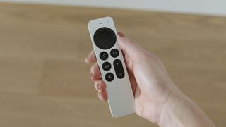 2021 Siri Remote in hand