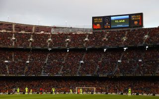 A packed Nou Camp watched the game