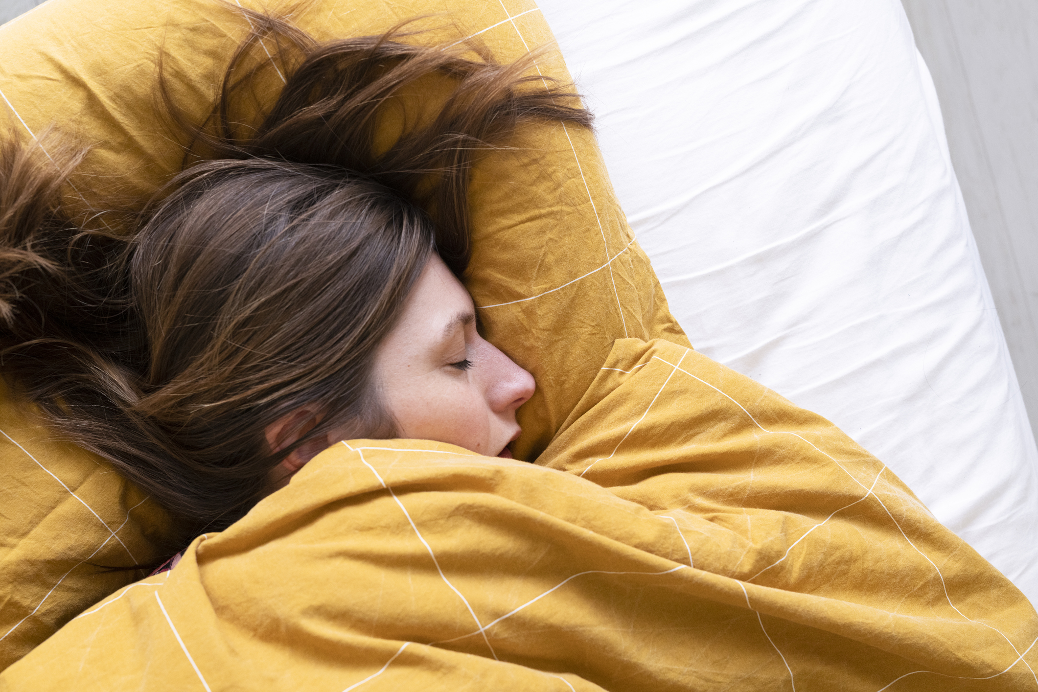Norovirus symptoms: a woman sleeping