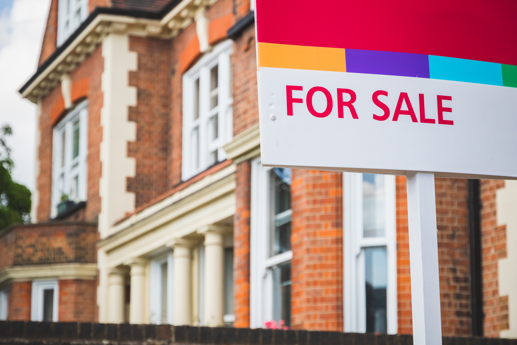 'For Sale' sign displayed outside a terraced house in Crouch End, London