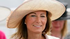 Carole Middleton wearing a straw hat