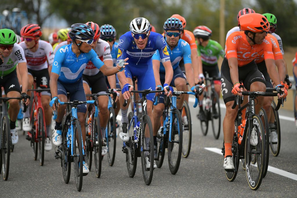 Nairo Quintana (Movistar) discusses the situation with Tim Declercq (Deceuninck-QuickStep)