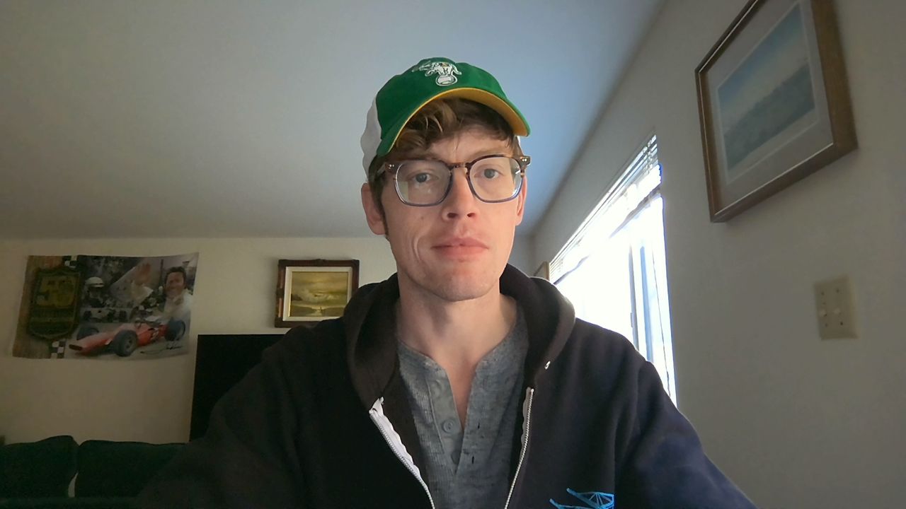 Dell XPS 16 vs MacBook Pro 16-inch webcam test photos