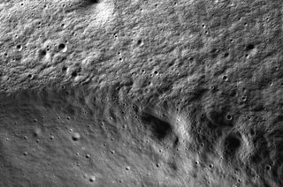 A portion of the permanently shadowed Marvin crater lit by reflected light and imaged by NASA's ShadowCam on Feb. 28, 2023. 