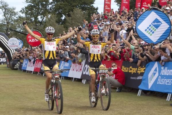 Christoph Sauser and Burry Stander of team 36One Songo-Specialized celebrate th