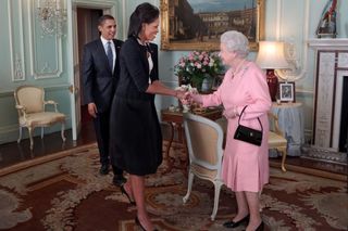 President Barack Obama and First Lady Michelle Obama are greeted by Britain's Queen Elizabeth at Buckingham Palace in London, April 1, 2009. The White House / Pete Souza