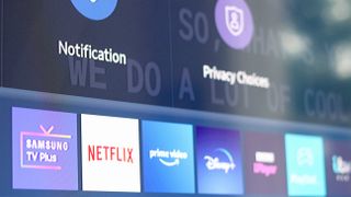 A close up of the Samsung Q60T QLED's app menu displaying Netflix, Prime Video and other apps.