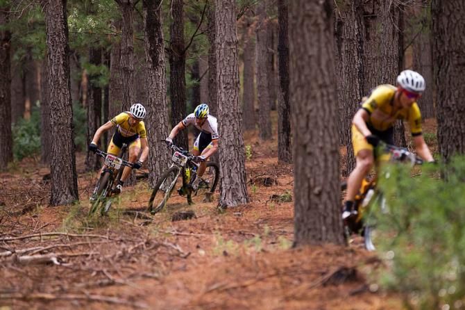 Christoph Sauser of Burry Stander-Songo and Karl Platt of Bulls follow Jaroslav Kulhavy