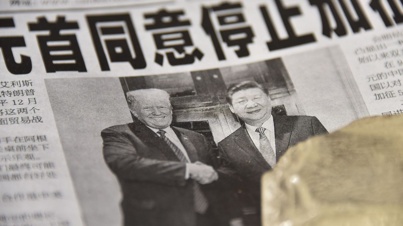 A Chinese newspaper&#039;s front page story about the meeting between Donald Trump and Xi Jinping in 2018