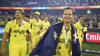 MELBOURNE, AUSTRALIA - MARCH 29:Shane Watson and Steve Smith of Australia celebrate during the 2015 ICC Cricket World Cup final match between Australia and New Zealand at Melbourne Cricket Gr
