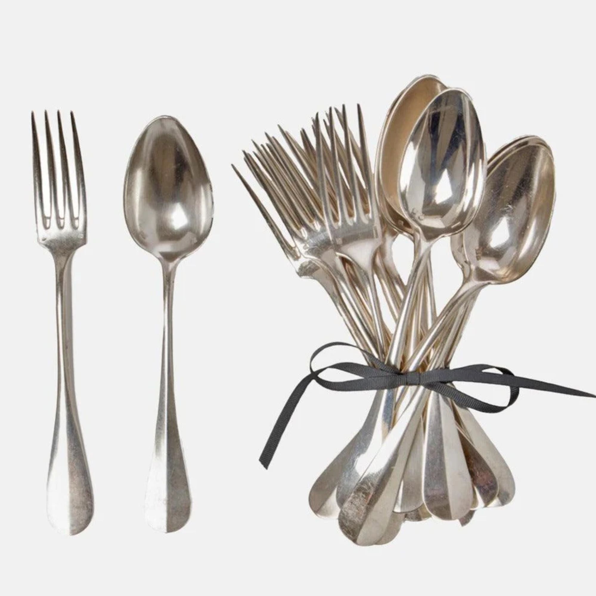 Antique silver flatware set
