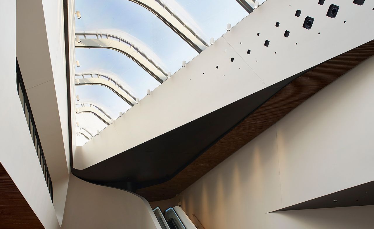 The three storey CityLife Shopping District in Milan is designed by Zaha Hadid Architects and features 100 shops, a food hall and cinemas