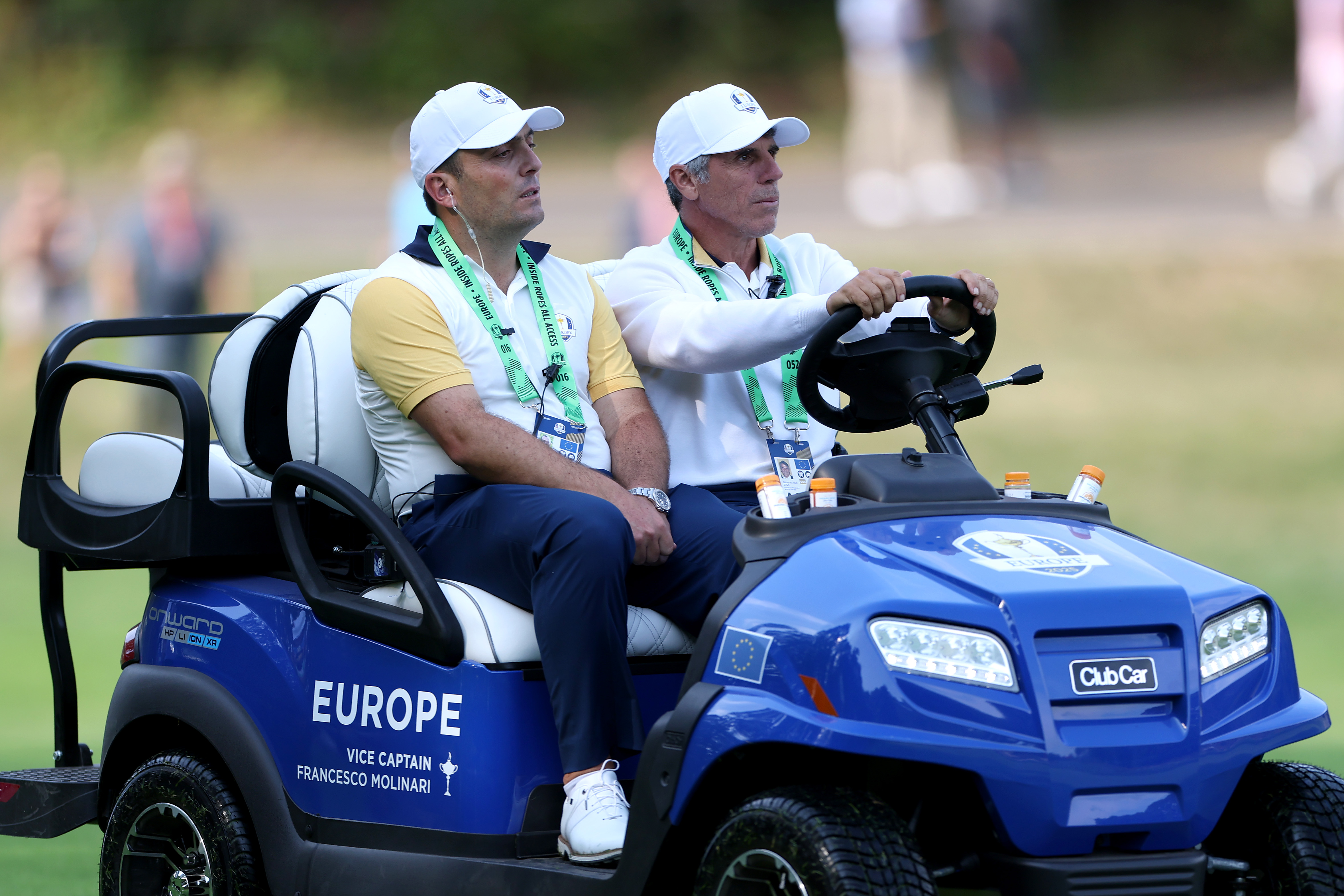 Gianfranco Zola drives Francesco Molinari in a buggy at Bethpage prior to the 2025 Ryder Cup