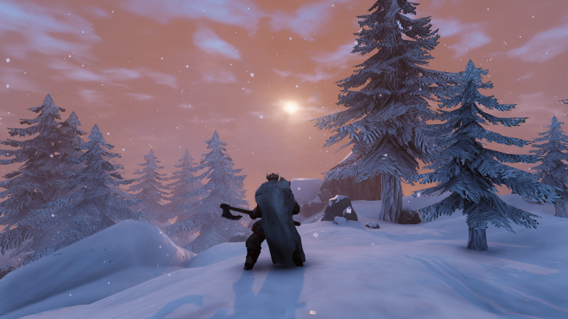 En spelare står i ett snötäckt skogslandskap i spelet Valheim.