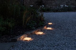 solar powered lights in a path