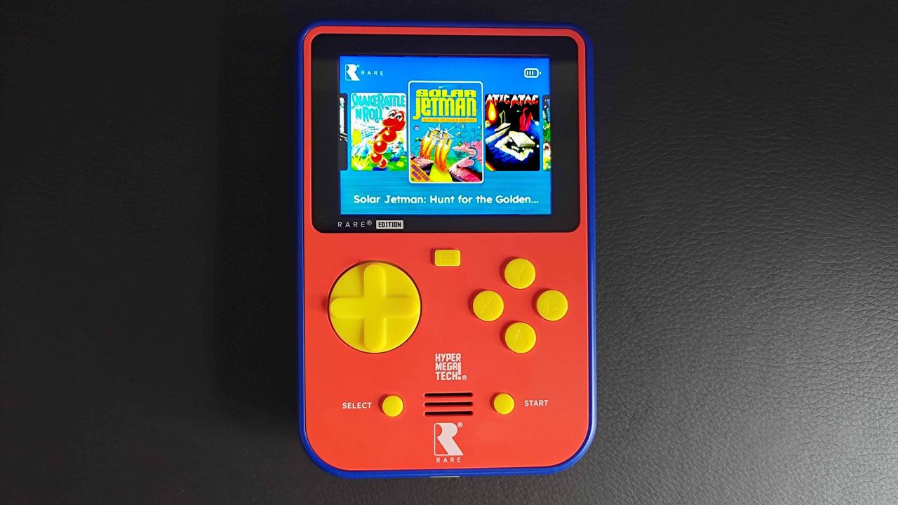 Super Pocket Rare Edition with game menu open and Solar Jetman selected on black desk.