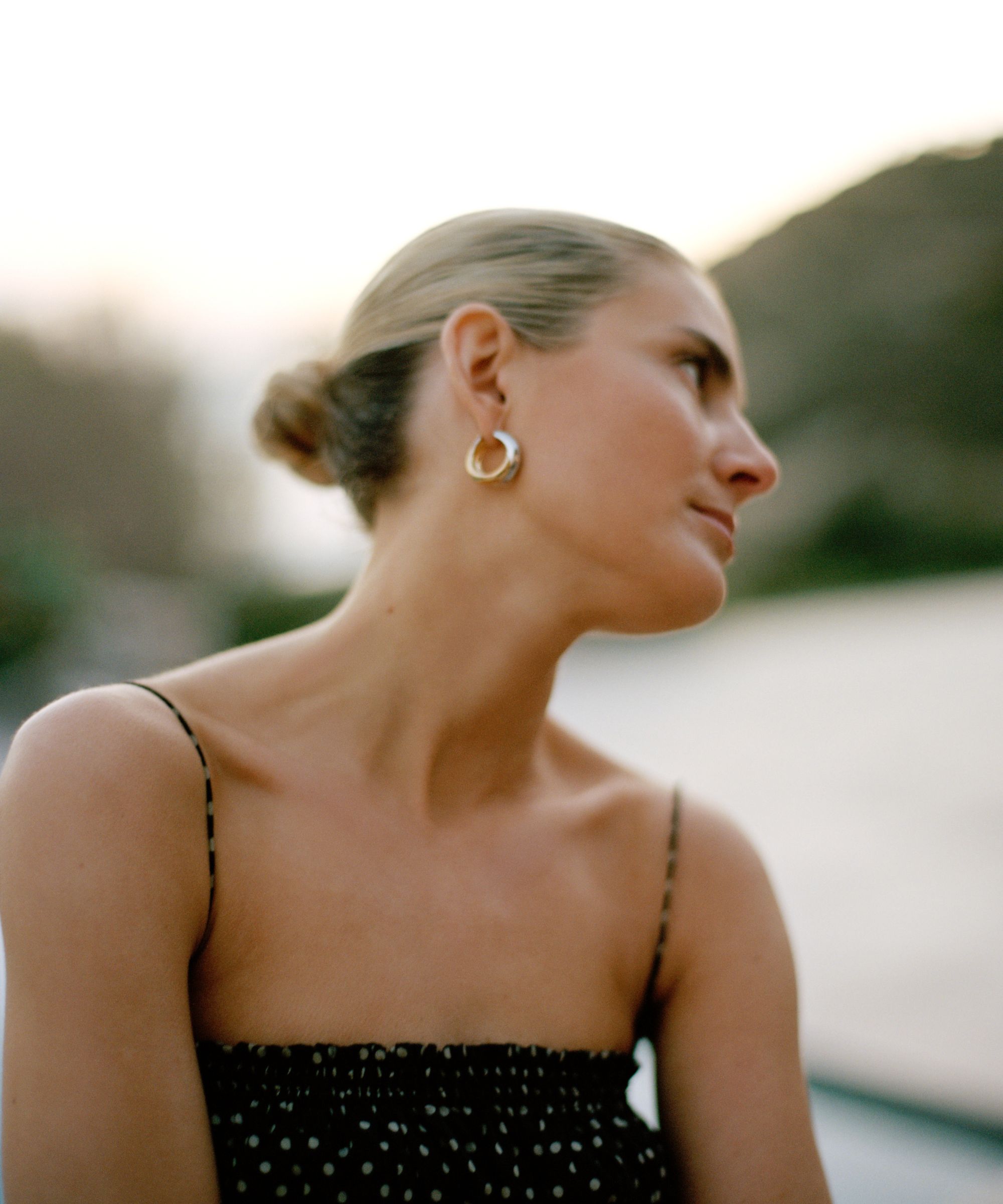 Lucy Williams wearing her Missoma earrings