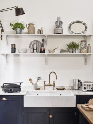 Bulter sink with shelving above