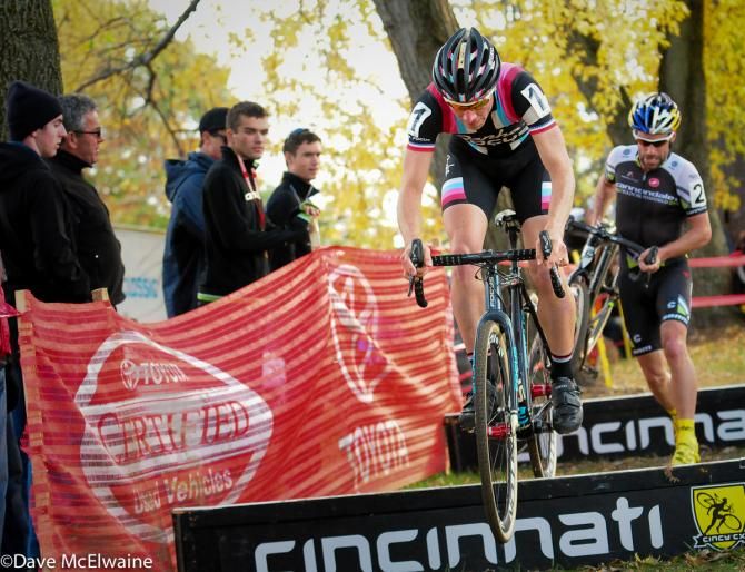 Jeremy Powers (Rapha Focus) jumps the barriers while Johnson runs them