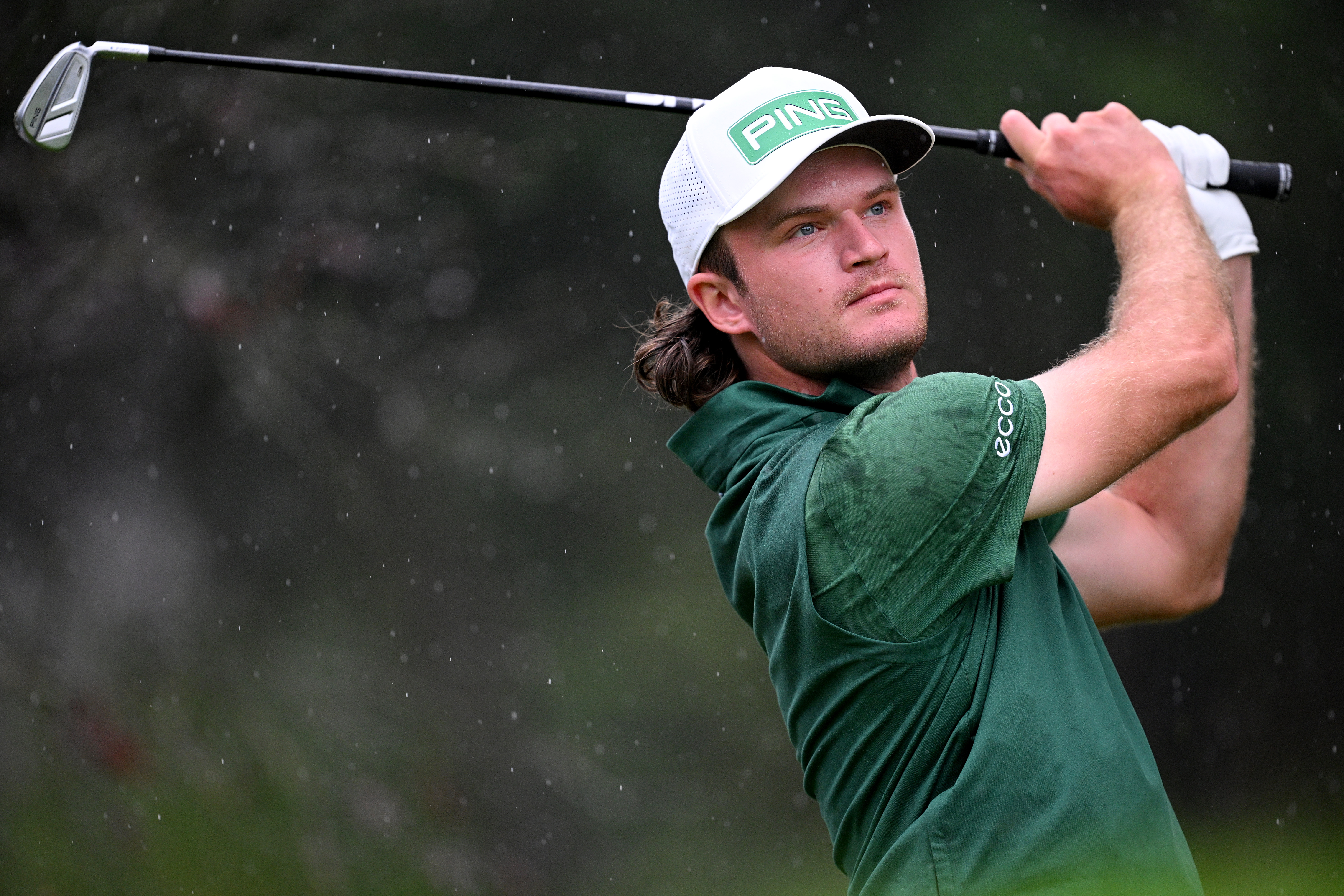 Freddy Schott hits a utility iron off the tee