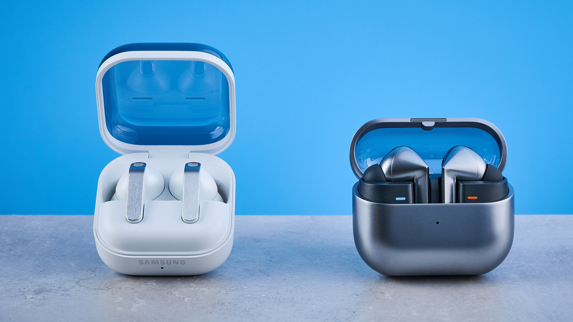 the samsung galaxy buds 3 pro photographed against the blue tom's guide background