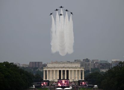 The Blue Angels fly over the National Mall on Thursday.