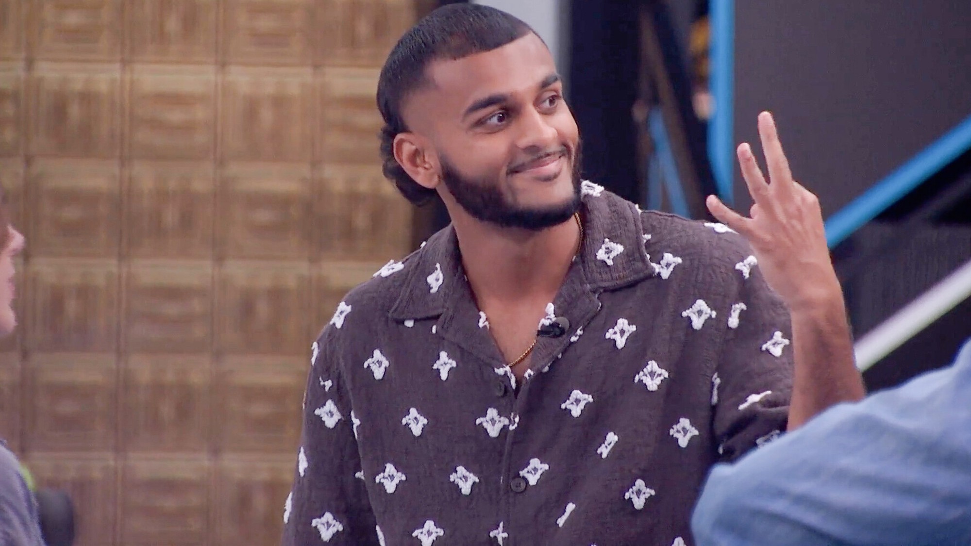 Yash holding up the 3 sign indicating his wins