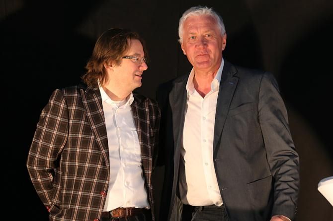 Presenter Mark Coucke and manager Patrick Lefevere