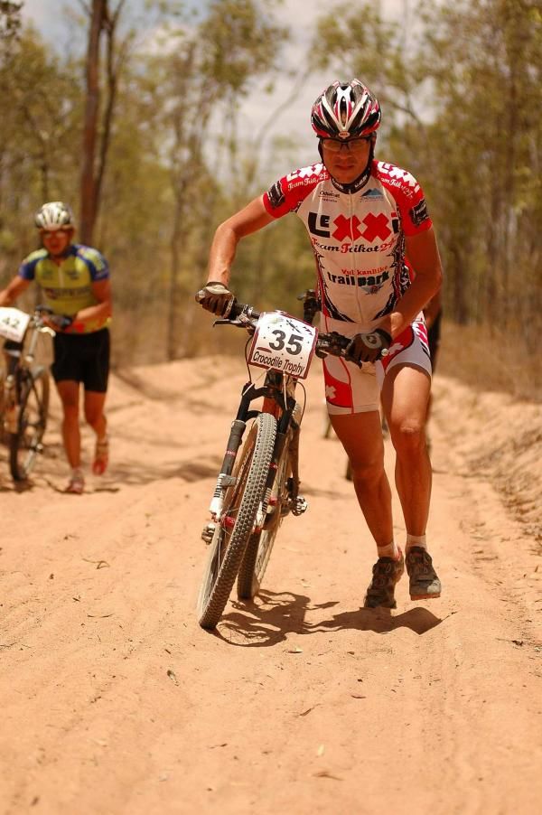 Nikolaus Syc running in soft sand