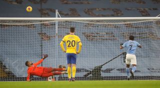 Raheem Sterling, right, sends his penalty over the bar against Brighton