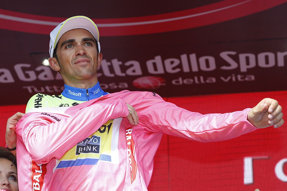 Alberto Contador (Tinkoff-Saxo) puts on the pink jersey