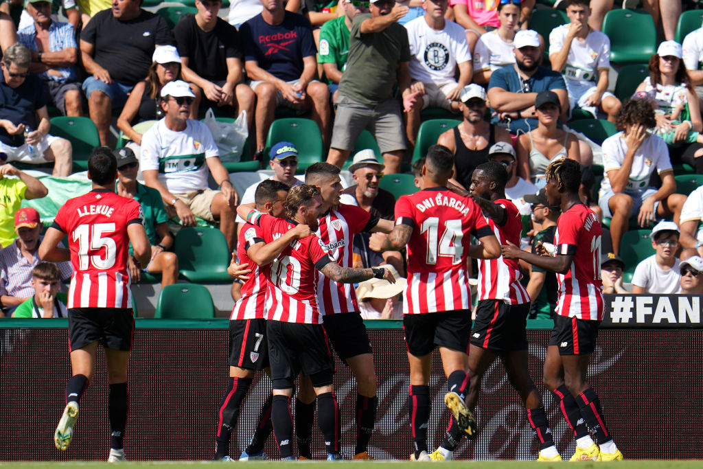 Inaki Williams of Athletic Club celebrates after their sides first goal with teammates, an own goal scored by Nicolas Fernandez of Elche CF during the LaLiga Santander match between Elche CF and Athletic Club at Estadio Manuel Martinez Valero on September 11, 2022 in Elche, Spain.