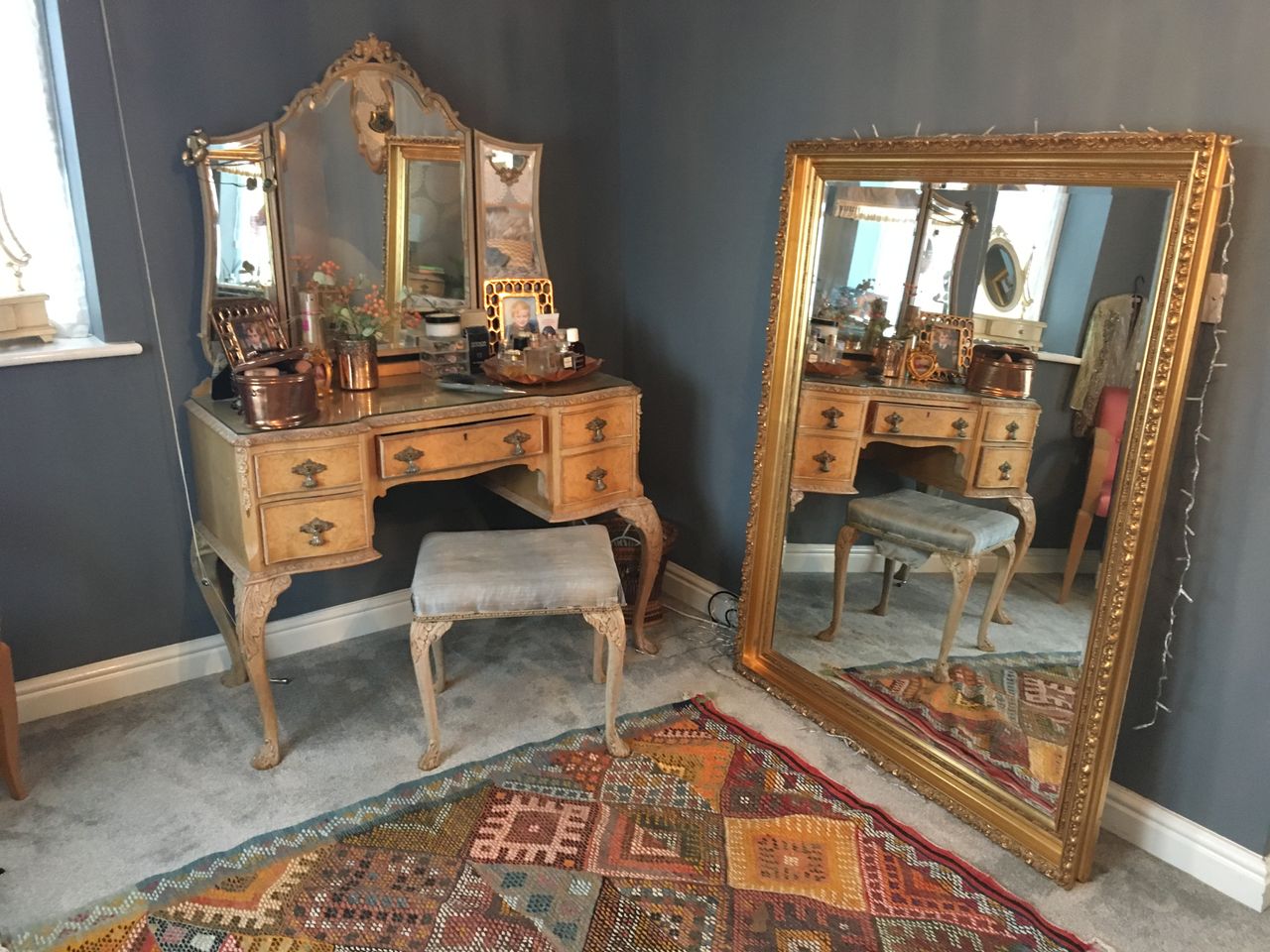 French style dresser and mirror in a bedroom