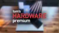 Blurred laptop with the Tom's Hardware Premium logo on top of it