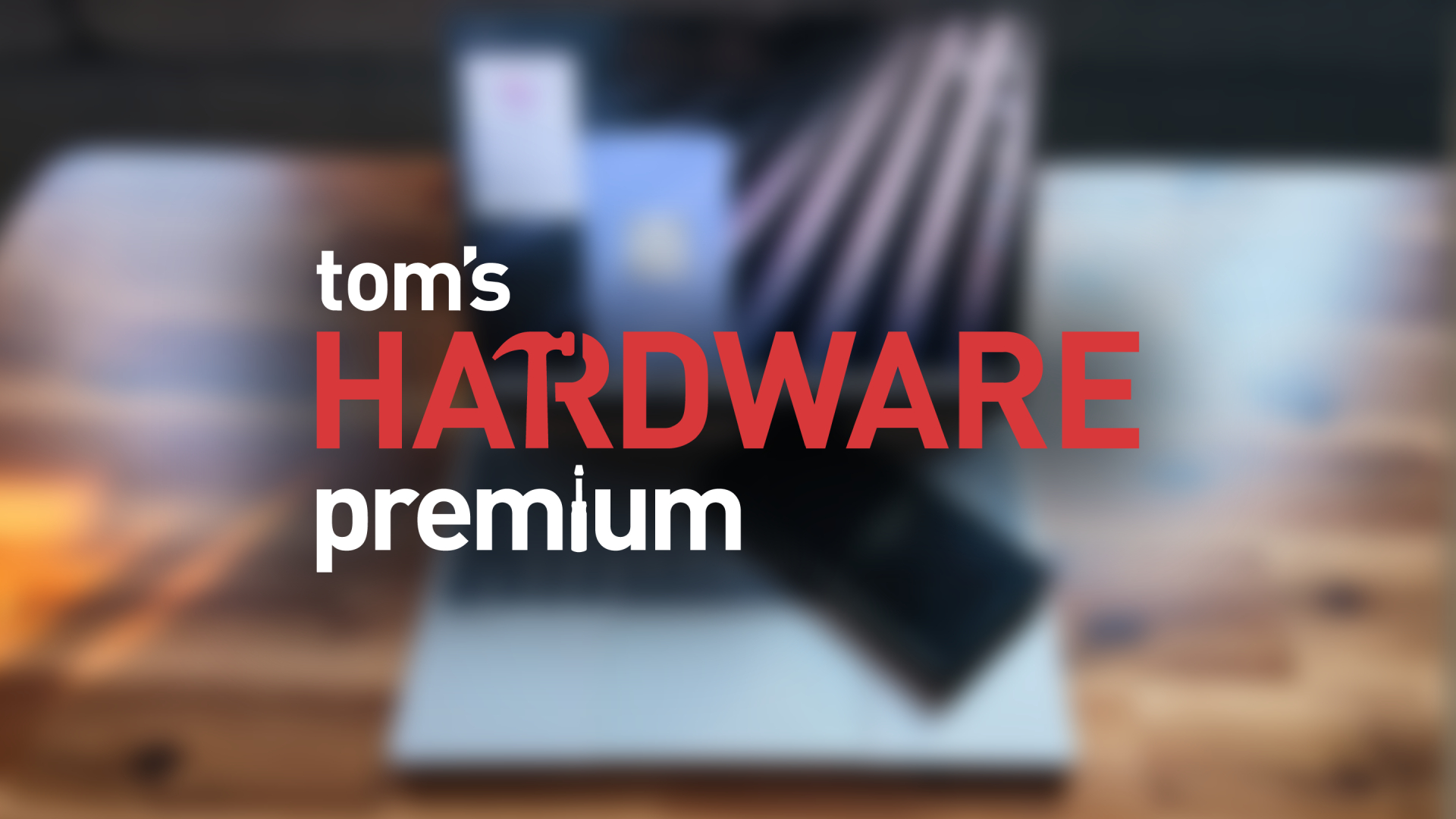 Blurred laptop with the Tom's Hardware Premium logo on top of it