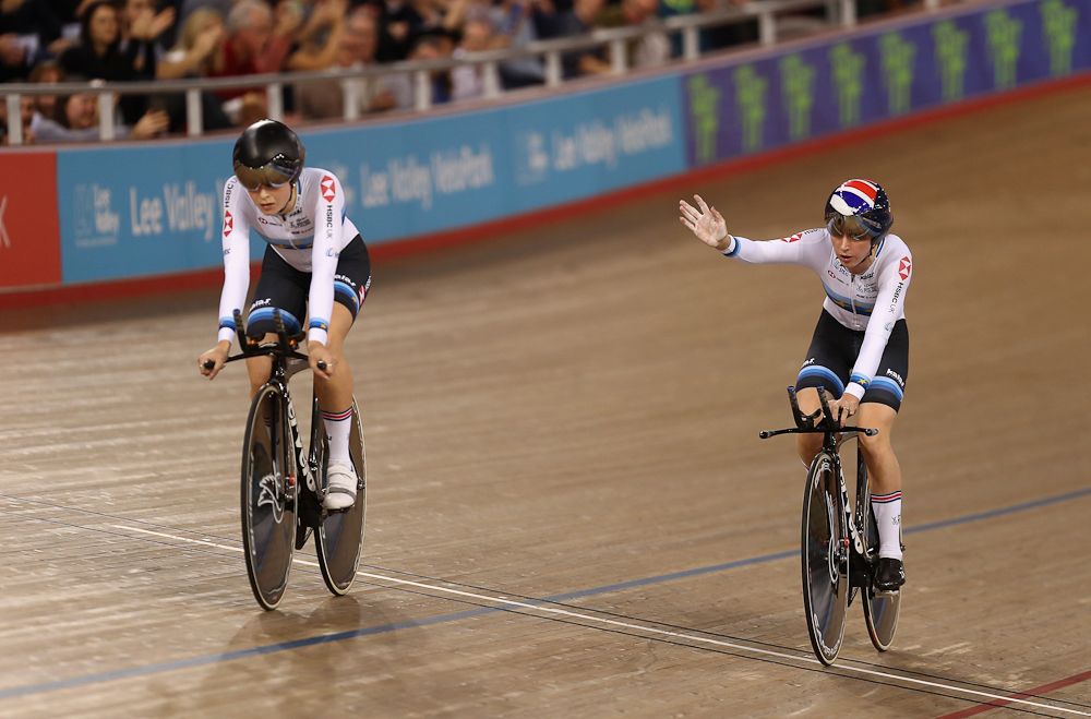 Laura Kenny of Great Britain(R) waves to the crowd during day One of the 2018 TISSOT UCI Track Cycling World Cup at Lee Valley Velopark Velodrome