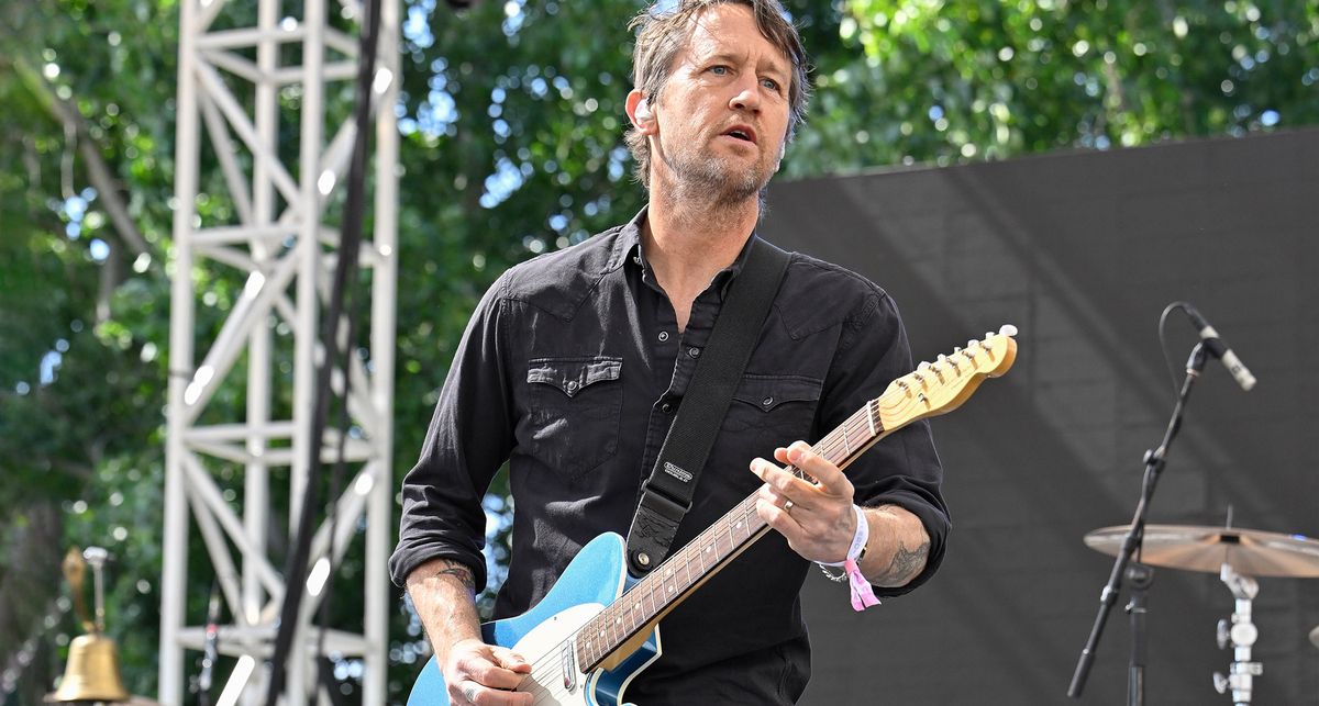 Chris Shiflett plays a Telecaster Custom in Lake Placid Blue on a sunlit stage in California