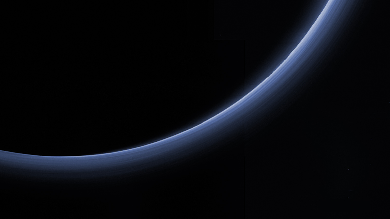 Blue-tinged haze around Pluto captured by NASA's New Horizons probe.