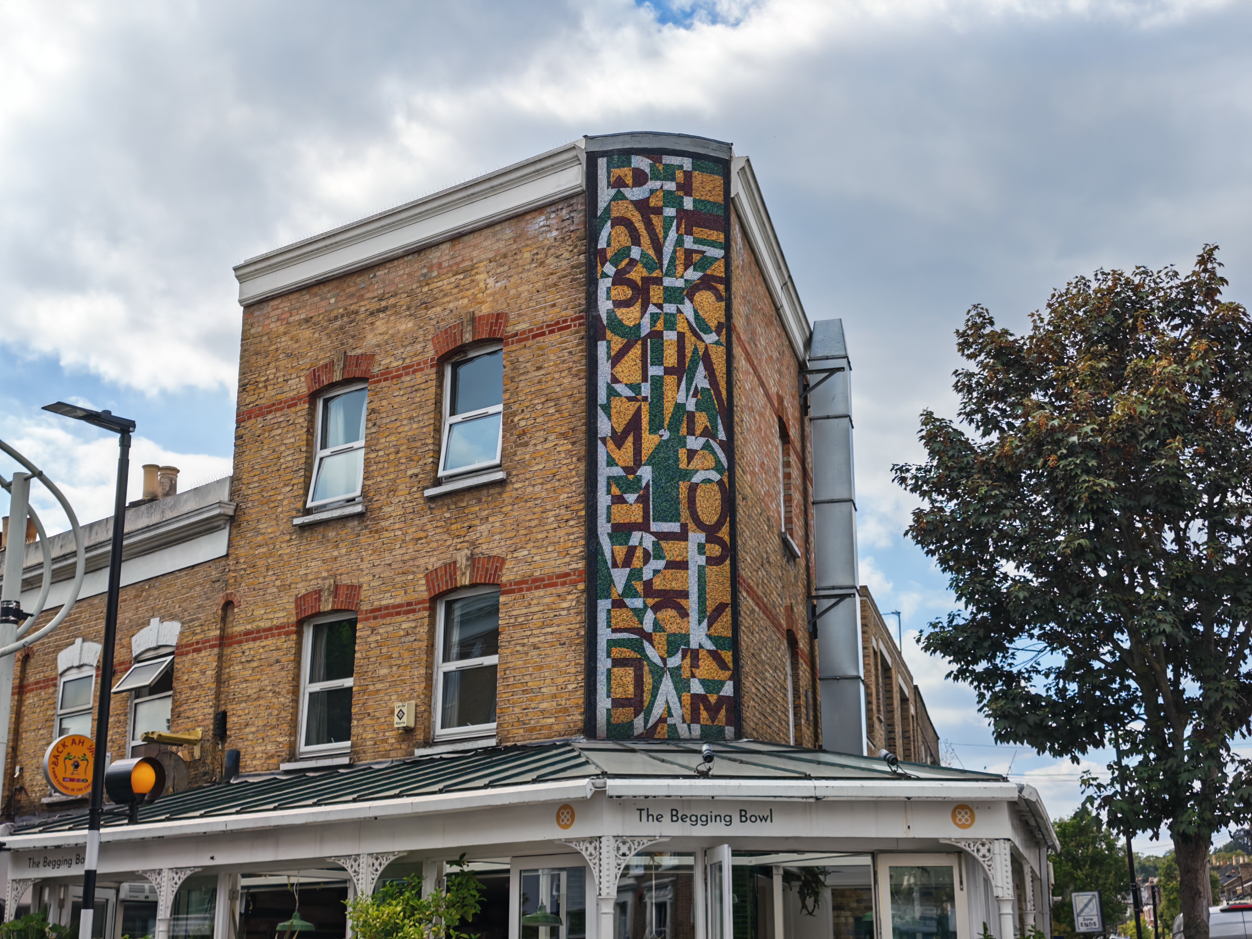 A building with mosaic decal