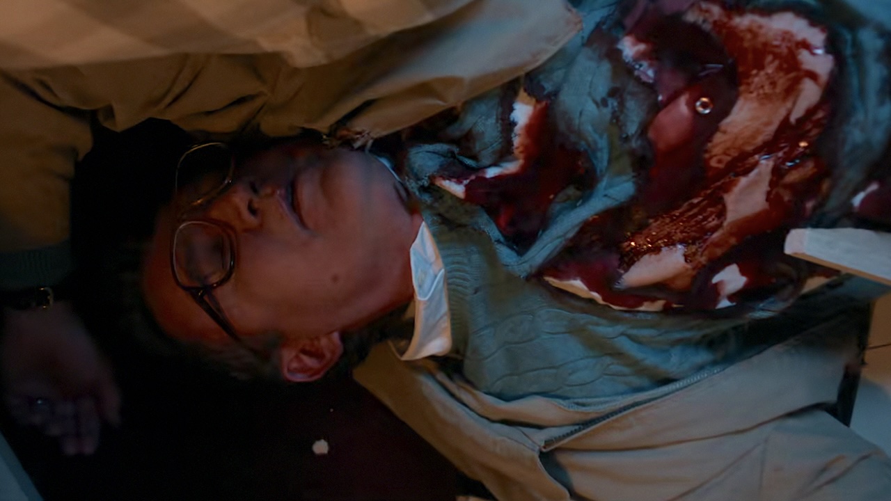 Ted Wheeler bloodied on floor in Stranger Things Season 5 Episode 2