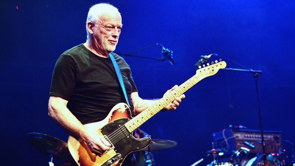 David Gilmour joins Richard Thompson on stage at his 70th Birthday Celebration Show at the Royal Albert Hall on September 30, 2019 in London, England. 