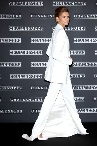 Zendaya at the Challengers Rome premiere in a white Calvin Klein suit
