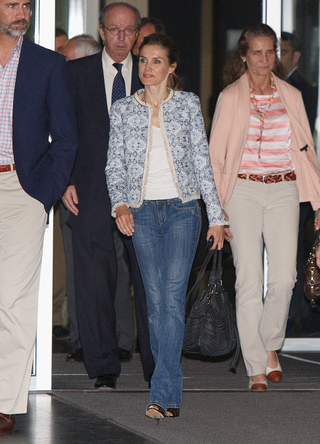 Prince Felipe of Spain (L), Princess Letizia of Spain (3L), Princess Elena of Spain (3R) and Queen Sofia of Spain (2R) leave Quiron University Hospital, where Spain's King Juan Carlos has undergone an operation, on September 25, 2013 in Pozuelo de Alarcon, Spain