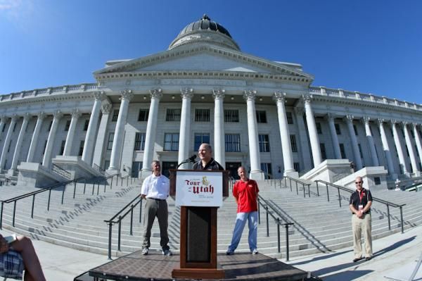 Bob Roll speaks about this year's edition of the Tour of Utah in front of the capitol building.