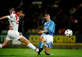 Marseille's Alen Boksic (right) takes a shot in a game against Lille in October 1993.