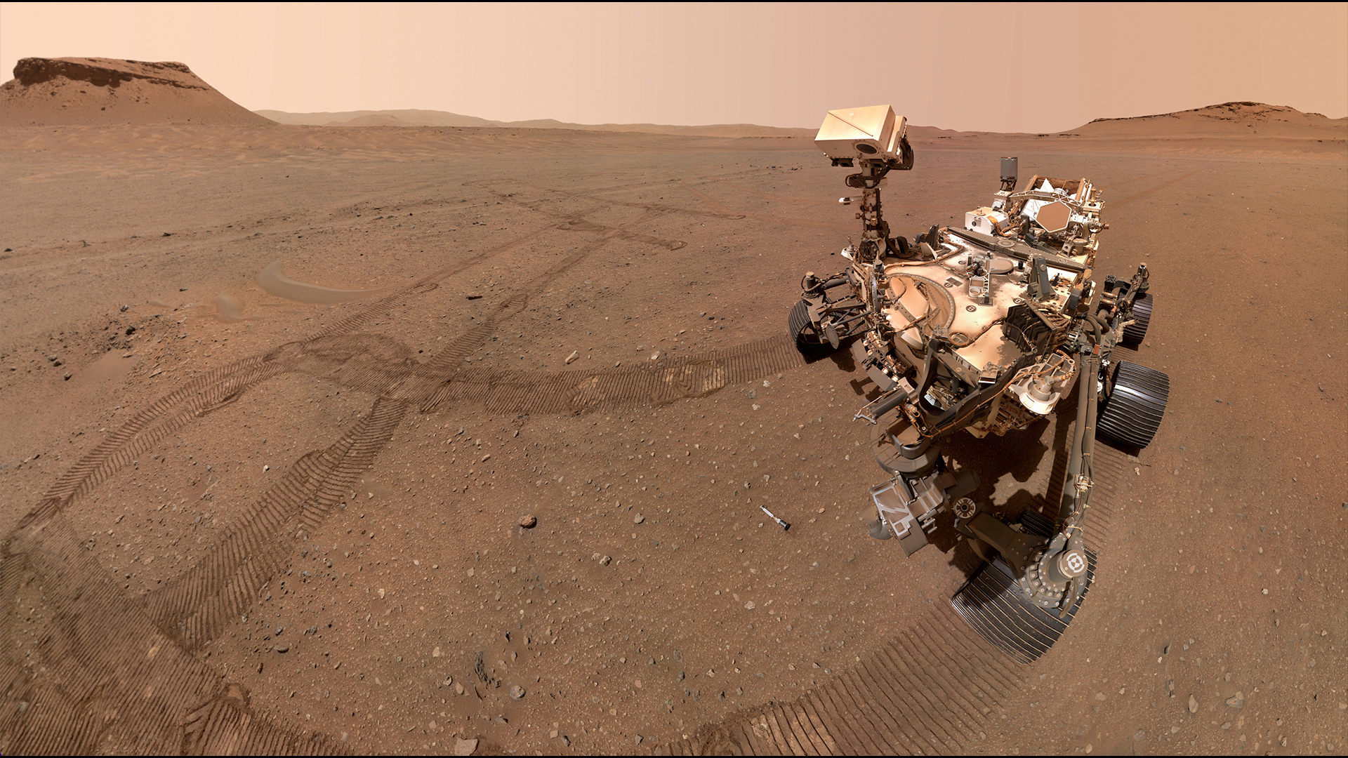 NASA's Perseverance Mars rover took this selfie looking down at one of 10 sample tubes deposited at the sample depot it created in an area nicknamed Three Forks. This image was taken by the WATSON camera on the rover’s robotic arm on Jan. 20, 2023, the 684th Martian day, or sol, of the mission.