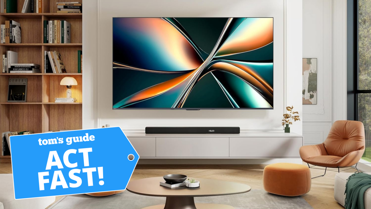 Hisense U65QF on wall in living room